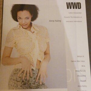 Lace, button-down, short-sleeved, "bodycon" lace blouse by Anna Huling.